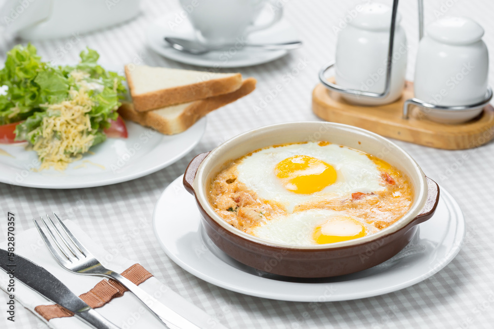 healthy breakfast, fried eggs in a pan healthy breakfast, fried eggs in a pan