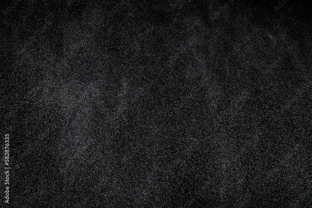Million of Star Dust, Photo image of falling down shower rain snow, heavy snows storm flying. Freeze shot on black background isolated overlay. Spray water fog smoke as star particle on wind Million of Star Dust, Photo image of falling down shower rain snow, heavy snows storm flying. Freeze shot on black background isolated overlay. Spray water fog smoke as star particle on wind