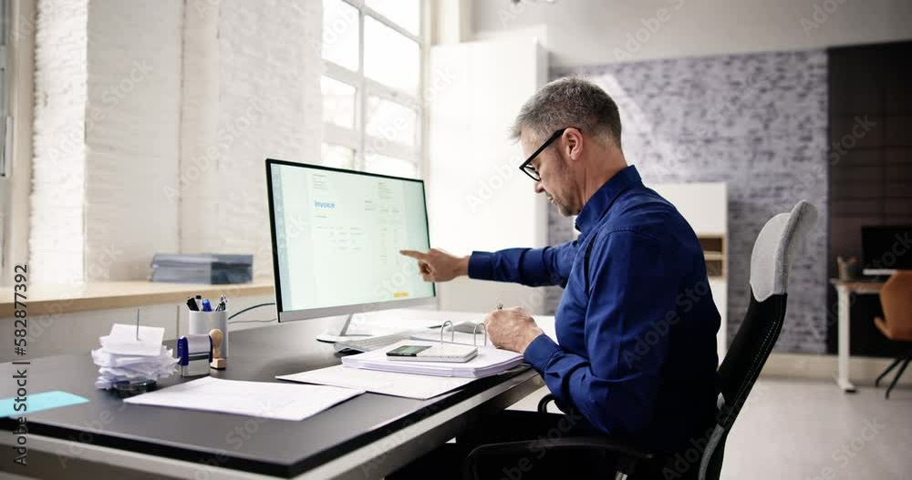 Accountant Using E Invoice Software At Computer Accountant Using E Invoice Software At Computer
