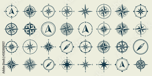 Vintage marine wind rose, nautical chart. Monochrome navigational compass with cardinal directions of North, East, South, West. Geographical position, cartography and navigation. Vector illustration.