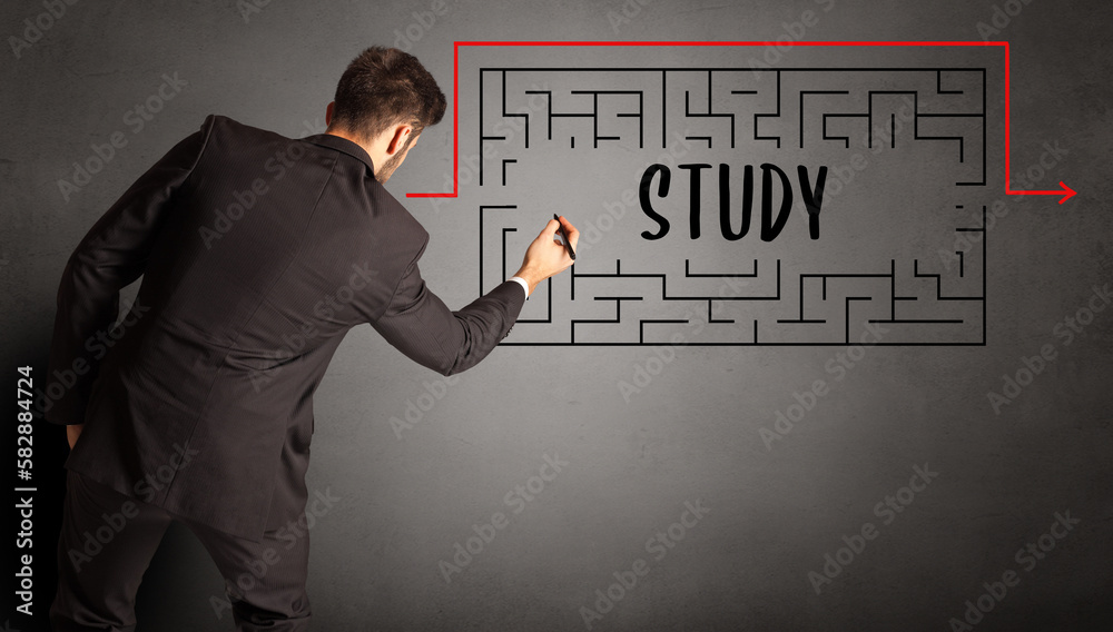 businessman drawing maze concept businessman drawing maze concept