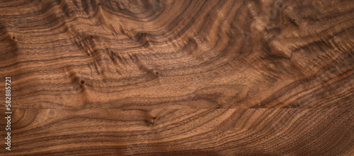 Walnut table top texture background. Walnut wood texture.