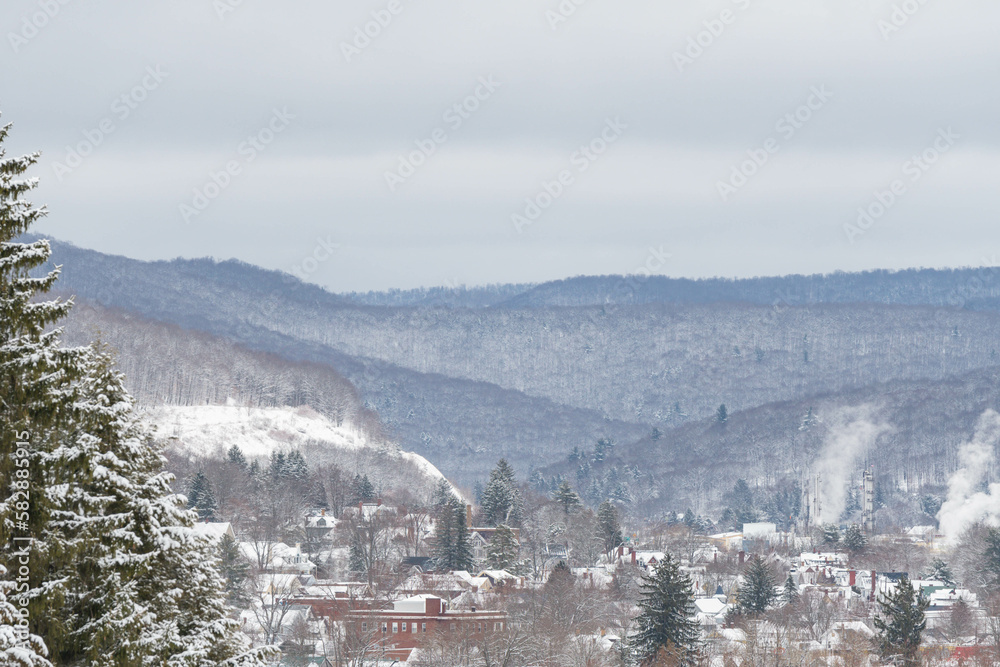 Valley town covered in snow, fresh winter landscape, Bradford county, Pennsylvania USA cinematic wonderful copy space image.