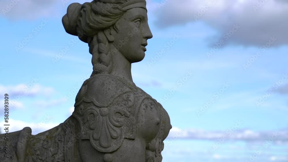 Statue. Statue of a woman in the form of a mystical animal.