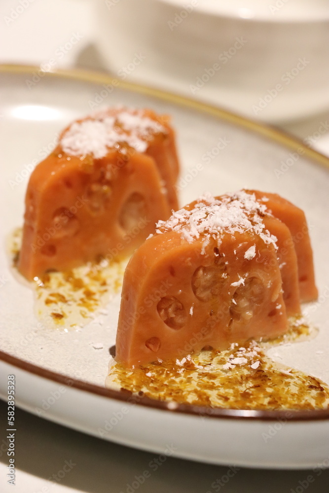 Sweet lotus root with rice on a plate Sweet lotus root with rice on a plate