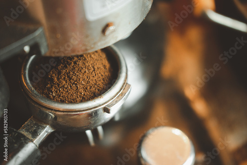 Close-up of coffee maker with grinder