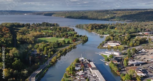 Early afternoon autumn aerial video of Ithaca New York near the inlet to Cayuga Lake.	 photo