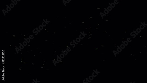 Dusty bullet hits on a wall with chunks of debris flying out . Powder explosion on black background. Impact dust particles. Dust explosion in front of black background, slow-motion . VFX