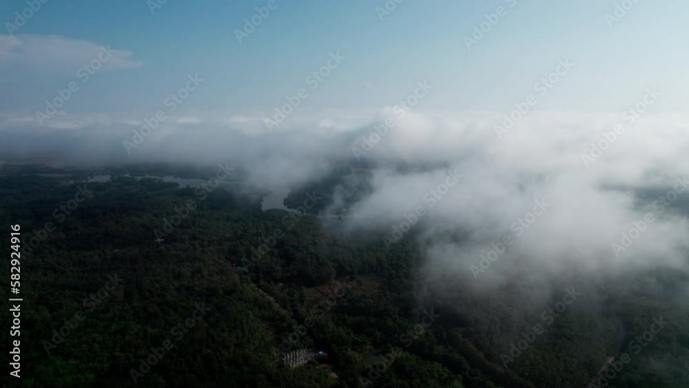 Top view Landscape of Morning Mist with Mountain Layer at north of Thailand. mountain ridge and clouds in rural jungle bush forest Top view Landscape of Morning Mist with Mountain Layer at north of Thailand. mountain ridge and clouds in rural jungle bush forest