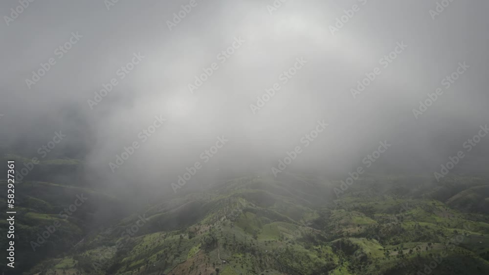 Top view Landscape of Morning Mist with Mountain Layer at north of Thailand. mountain ridge and clouds in rural jungle bush forest Top view Landscape of Morning Mist with Mountain Layer at north of Thailand. mountain ridge and clouds in rural jungle bush forest