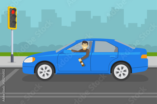Fototapeta Naklejka Na Ścianę i Meble -  Drunk driver stopped at traffic signal. Happy male driver in a blue car holding a bottle. Young character leaning out of the car window. Side view. Flat vector illustration template.