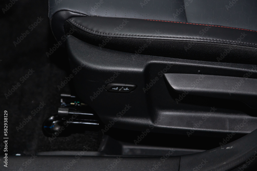 close-up of seat adjustment buttons. modern car interior