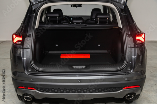 Clean, open empty trunk in the gray car SUV