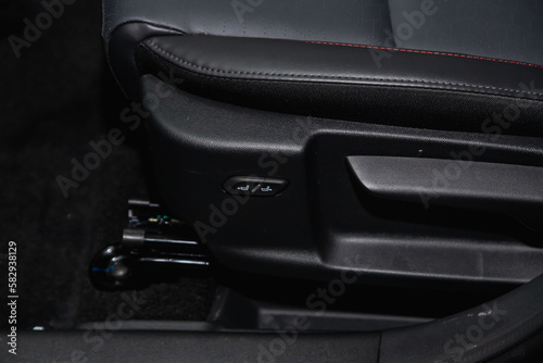close-up of seat adjustment buttons. modern car interior