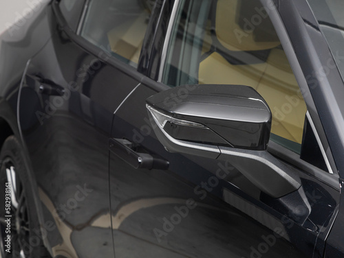 Wallpaper Mural  Side mirror of a  black car close-up. Exterior detail Torontodigital.ca