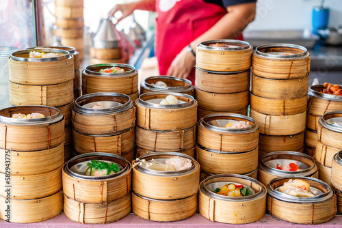 Bild auf Leinwand Traditional Chinese Dim Sum in bamboo basket at restaurant