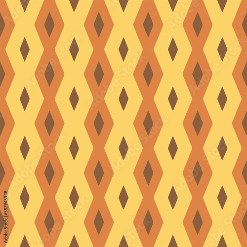 seamless yellow  orange and brown diamond pattern for wallpapers  backgrounds and Indonesian batik cloth motifs