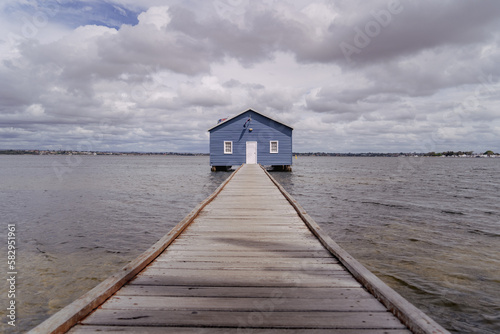 wooden blue cabin on the sea