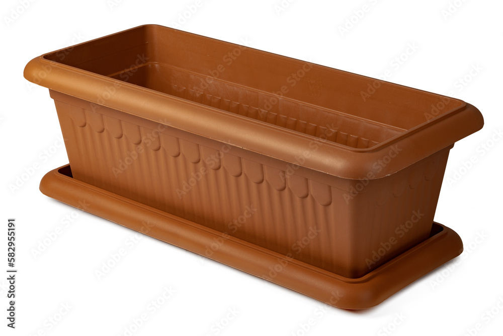 Brown plastic flower pot isolated on a white background Brown plastic flower pot isolated on a white background
