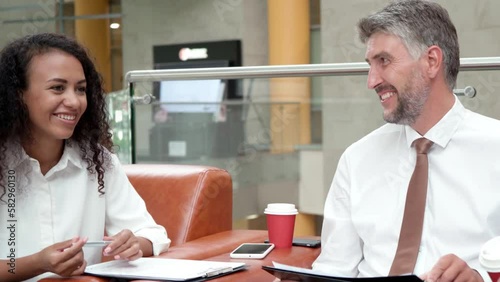 business partners discussing the terms of a new contract.