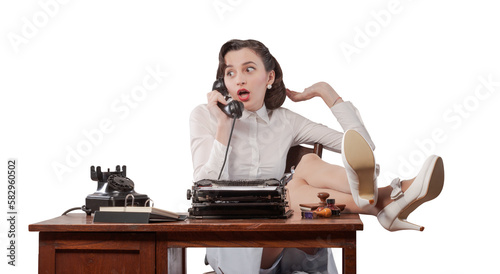 Lazy vintage style secretary having phone calls photo