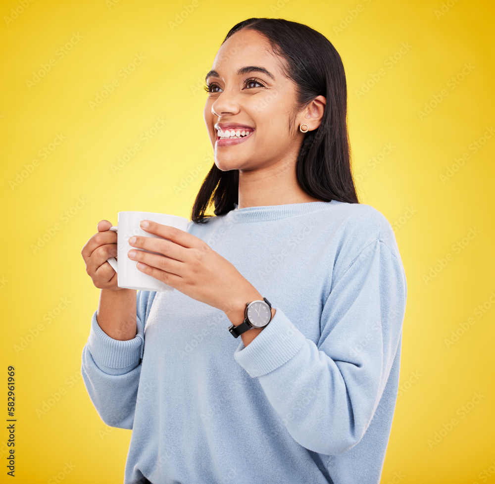 Morning, coffee mug and happy woman in a studio with a smile from espresso. Isolated, yellow background and smile of a young female with happiness and joy ready to start the day with confidence