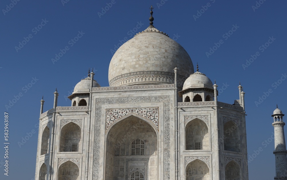 Taj Mahal, Agra, Uttar Pradesh, India, sunny day view, an ivory-white marble mausoleum on the south bank of the Yamuna river in the Indian city of Agra, Uttar Pradesh.