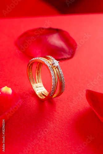 wedding rings on red velvet