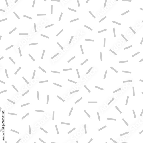 Grey dash confetti seamless vector pattern