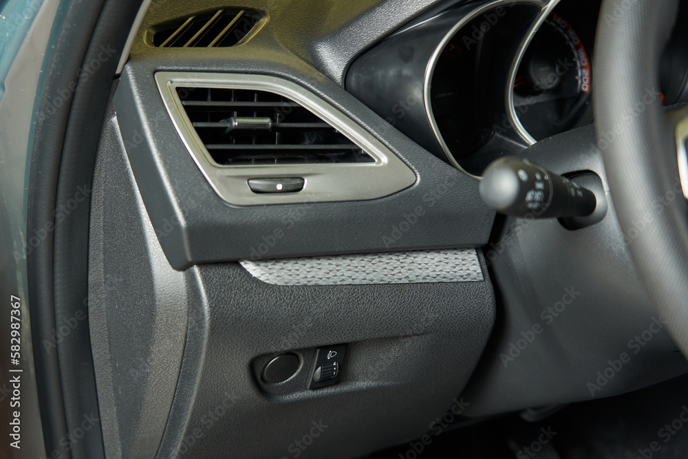Gray car interior ventilation vents