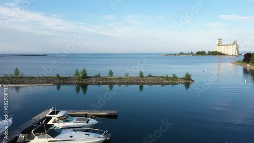 Drone flying over boats docked at a harbor in Collingwood. photo