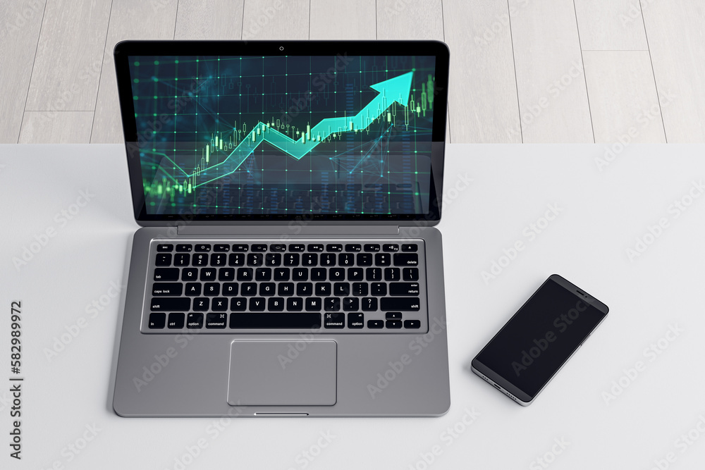 Close up and top view of laptop and mobile phone on office desktop with growing green candlestick arrow. Financial growth, market and trade concept. 3D Rendering. Close up and top view of laptop and mobile phone on office desktop with growing green candlestick arrow. Financial growth, market and trade concept. 3D Rendering.