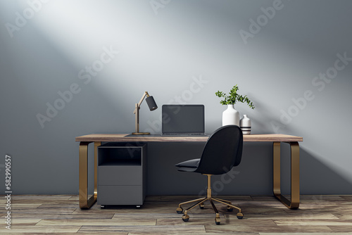 Modern home office interior with furniture, decor, laptop, concrete wall and wooden flooring. Workplace concept. 3D Rendering. photo