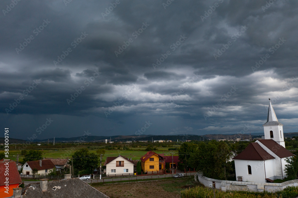 Summer storm over a small village in Romania.