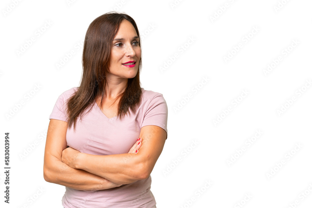 Middle-aged caucasian woman over isolated background looking to the side and smiling Middle-aged caucasian woman over isolated background looking to the side and smiling
