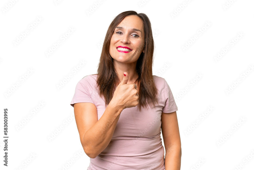 Middle-aged caucasian woman over isolated background giving a thumbs up gesture Middle-aged caucasian woman over isolated background giving a thumbs up gesture