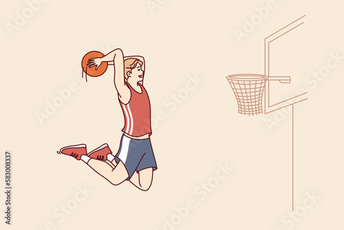 Professional basketball player bounces with ball in hands to score goal in hoop and defeat opposing team. Man basketball player trains wanting to become champion and participate in competitions