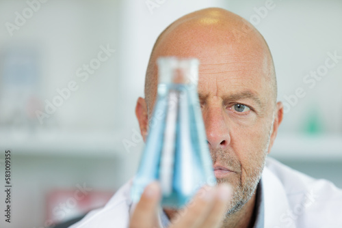 portrait of male chemist in lab