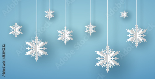 Merry Christmas or New year card with white origami snowflake or ice crystal on blue background. Vector illustration art in paper cut design.