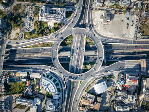 Fotografia Aerial top view of multilevel junction ring road as seen in Attiki Odos toll roa