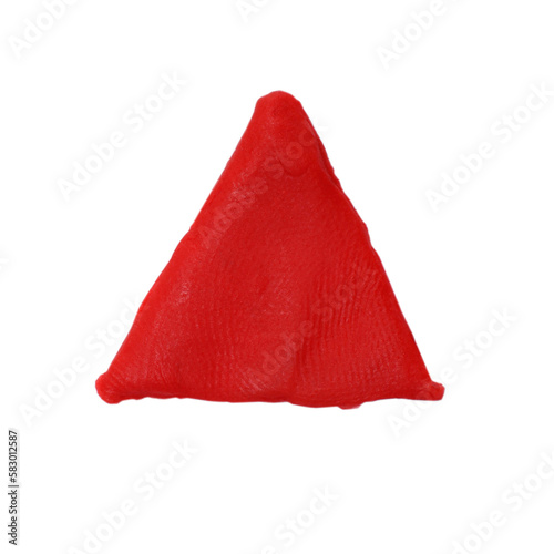 Red plasticine triangle isolated on white