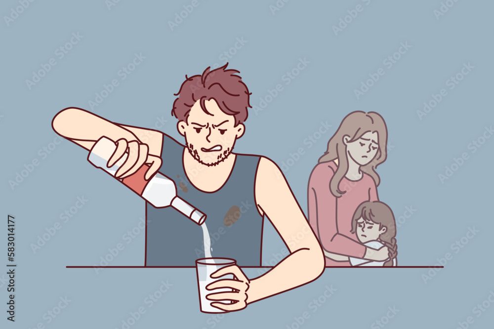 Drinking father sitting at table, pours vodka into glass, ignoring