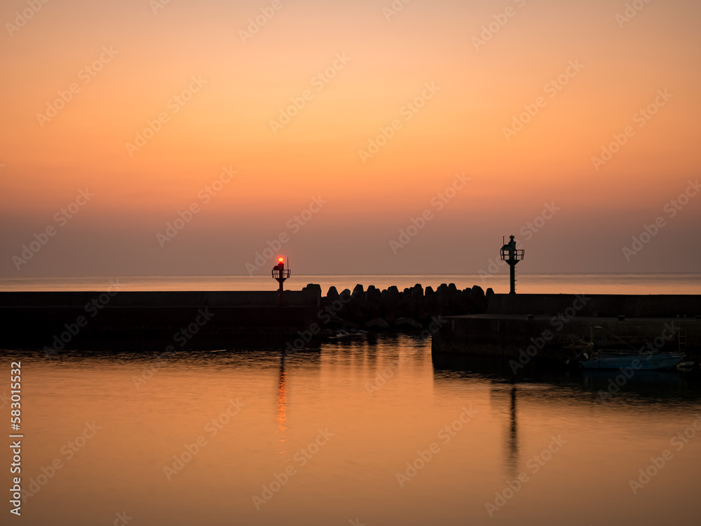 Sunset port and lighthouse in Taiwan