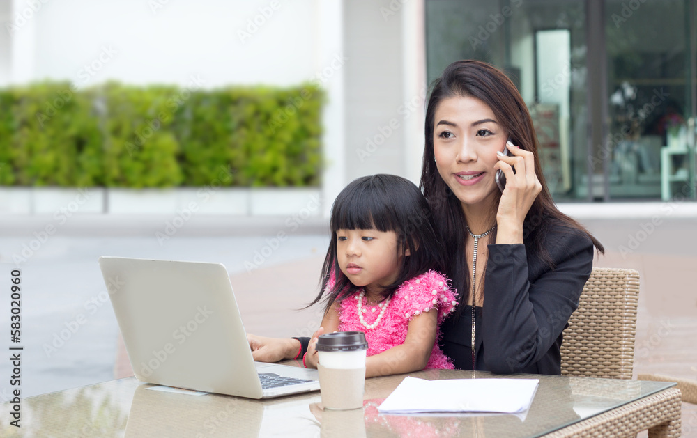 Mother is busy working and taking care of her children during the semester break.Mother is busy working and taking care of her children in summer break school to take care her family with woking Mother is busy working and taking care of her children during the semester break.Mother is busy working and taking care of her children in summer break school to take care her family with woking