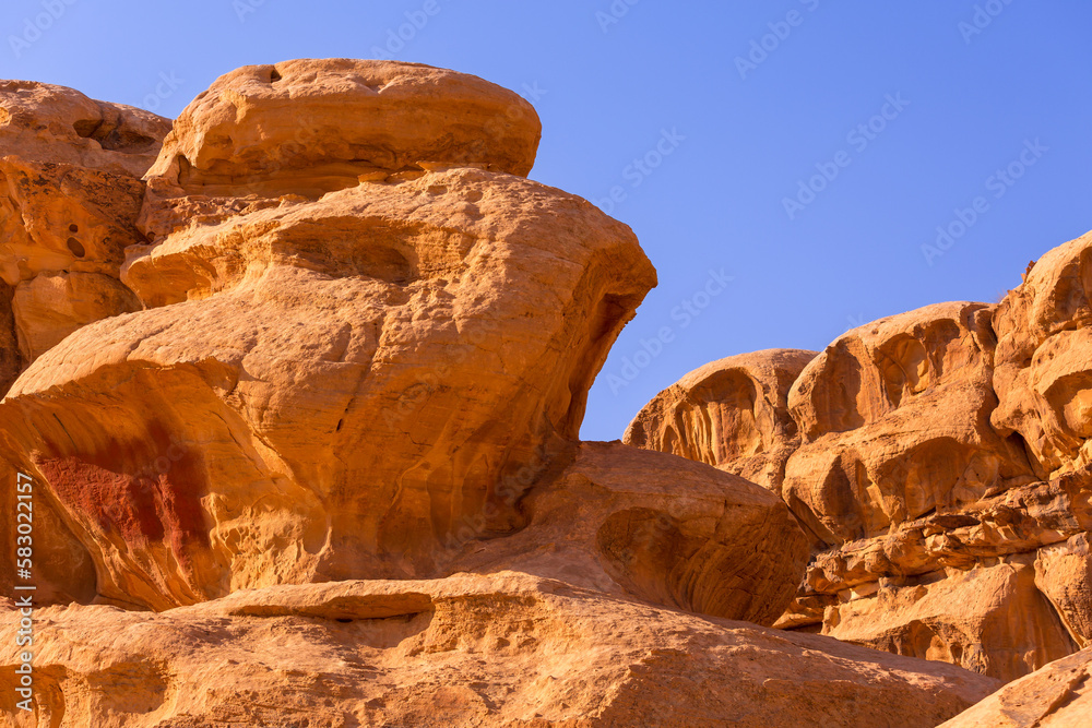 Wadi Rum, Jordan beautiful view of orange mountain sandstone rocks close-up