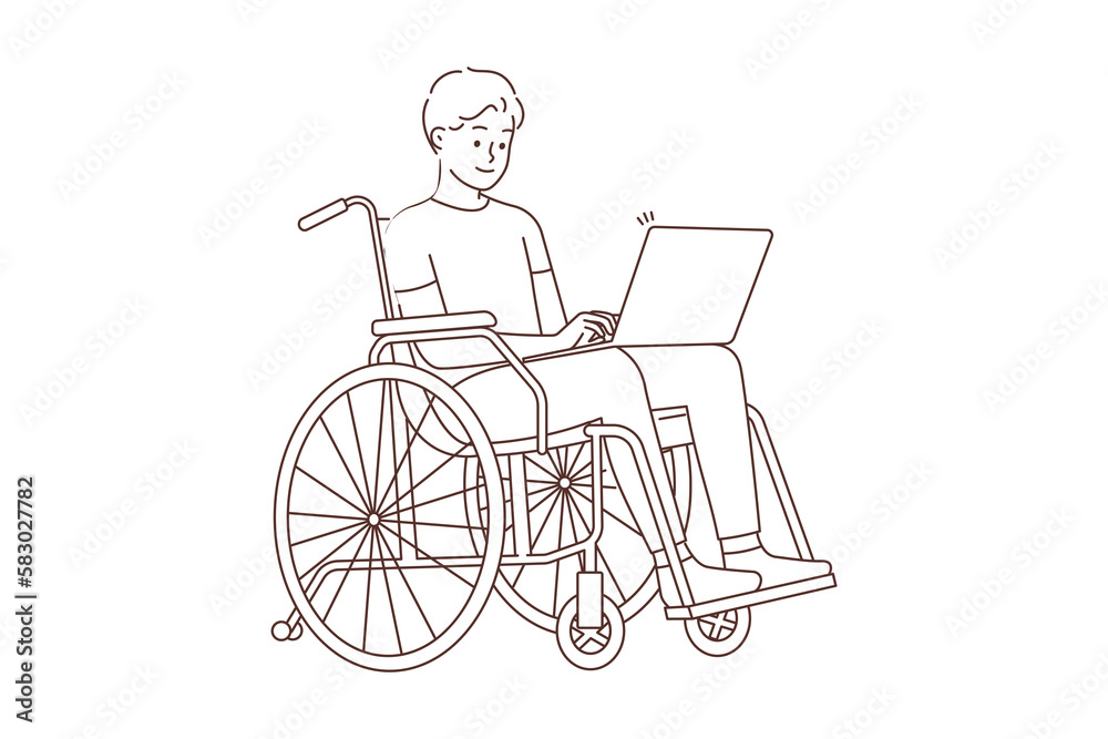 Smiling man in wheelchair work on computer Smiling man in wheelchair work on computer