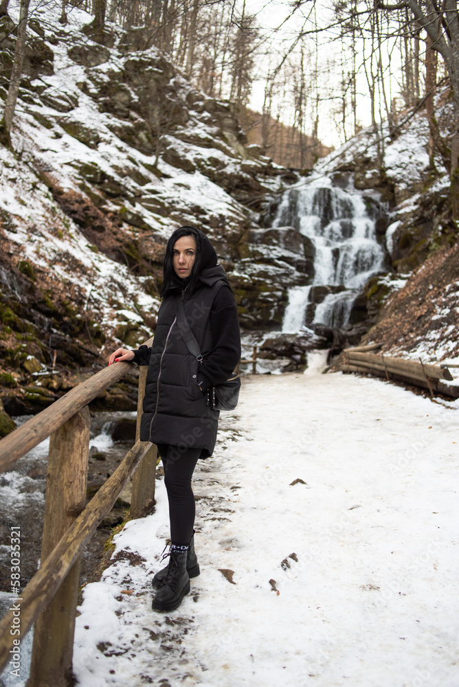 Woman near mountain river. Rest and fun Woman near mountain river. Rest and fun
