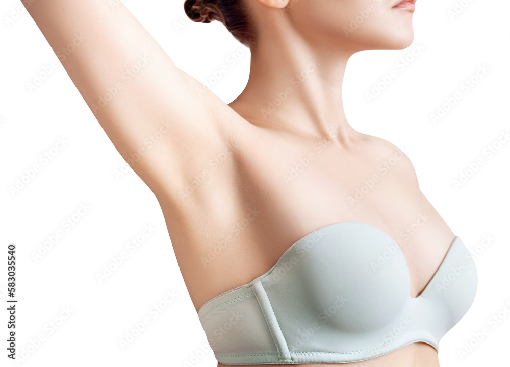 Young woman showing her smooth armpit.