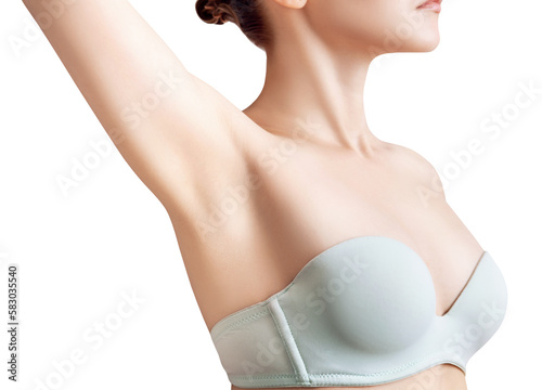 Young woman showing her smooth armpit. photo