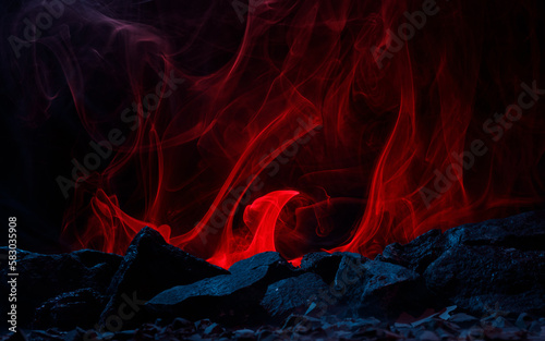 Dark scary rocks in the smoke. Fantastic and fabulous composition on dark background. Panoramic view of the fog. Layout for your logo. 